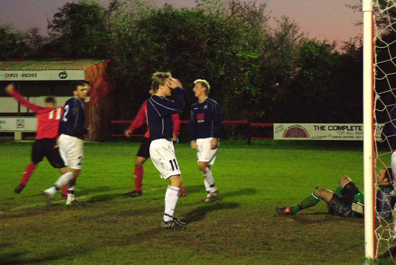 Danny Curd turns away to celebrate
