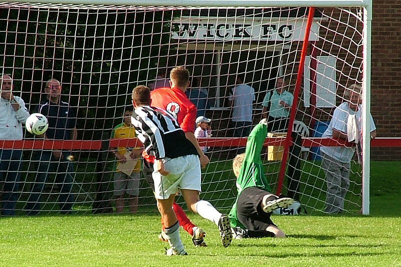 Danny Curd gets Wick's third
