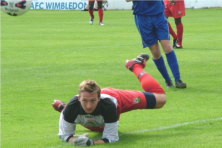 Barnet keeper goes down
