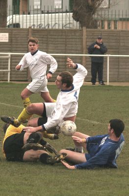 Keeper Darren Lambert charges out to intercept as Michael Onions (5) tackles Martin O'Donnell (10)
